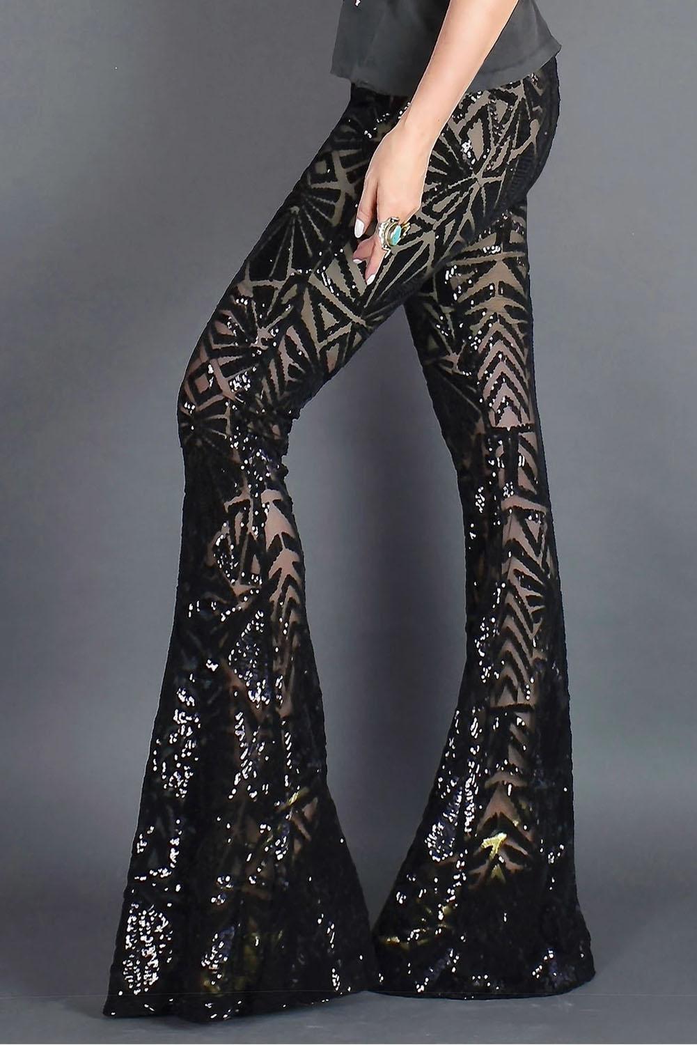 Бежево-черные блестящие брюки с абстрактным узором и клешем от колена арт.121828
