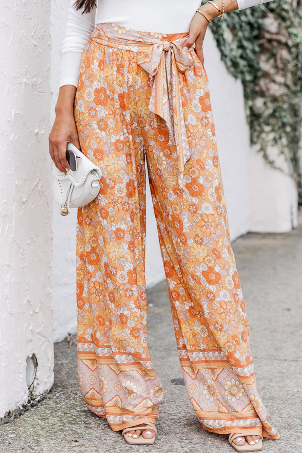 Оранжевые широкие брюки с флористическим принтом в стиле Бохо арт. 1884439